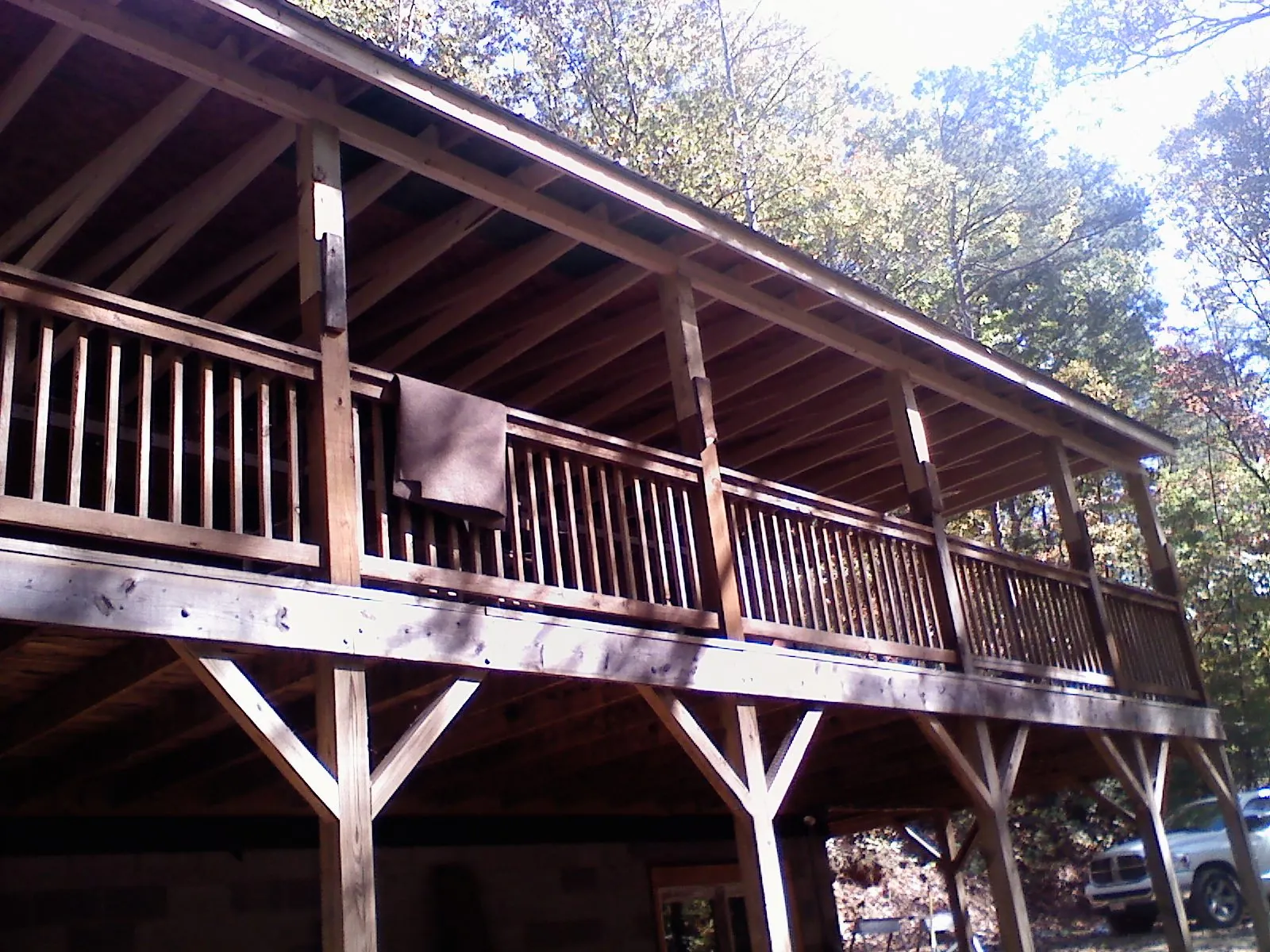 Timber framing under a new elevated porch and deck — Roof Leak Repair in Mcloud by Roofing Brothers